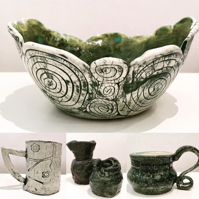 Ceramic vessels with varying shapes and colors.