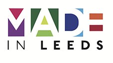 Colorful block lettering spells out 'MADE IN LEEDS'. Each letter has a different vibrant color and geometric pattern.